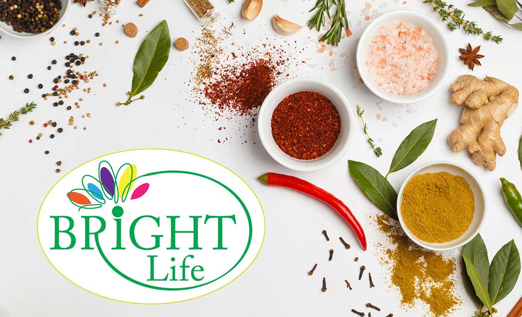 Bright Life surrounded by colourful spices and fresh herbs